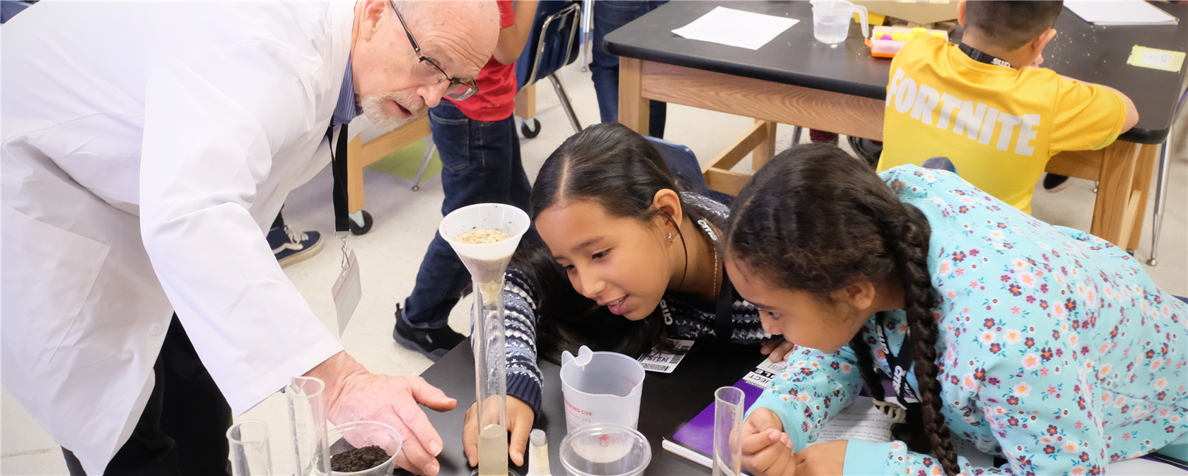 Learning Communities K-8 School - CMS students working on chemical lab studies